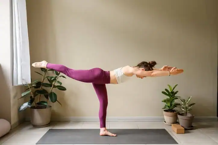 Achieving the Perfect Tone: How Often Should You Exercise for Results? 1 Woman doing Yoga exercise Watford to help with toning the body.